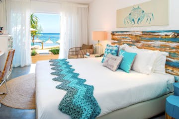 Deluxe Ocean View room bed